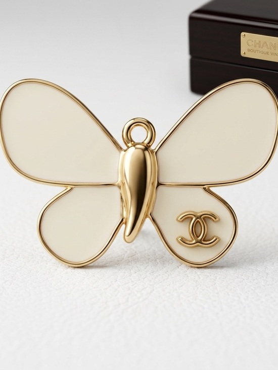 Chanel. Jewelry - ChaneI Cream and Gold Butterfly 🦋 Pendant